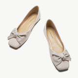 Stylish and comfortable pearl white bowknot square flats, ideal for a bold and trendy style.