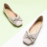 A pair of vibrant pearl white bowknot square flats for a bold and stylish look.