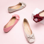 pearl white bowknot flats - a statement-making addition to your footwear collection