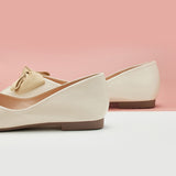 Step into sophistication with these timeless white eather square-toe flats, complete with a graceful bowknot accent for a classic and versatile footwear choice.