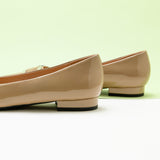 Metal Buckle Flats in Beige with a pointed toe, featuring classic details for a refined and understated look