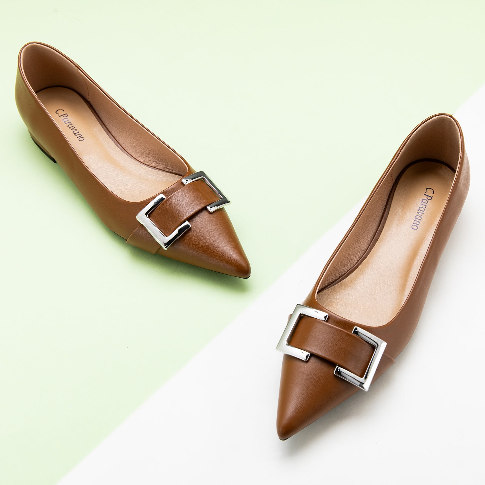 Brown Flats with a stylish Metal Buckle and Pointed Toe, perfect for a confident and fashionable look in any urban setting