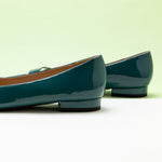 Peacock Blue Pointed Toe Flats with a metallic buckle, a unique and sophisticated addition to your footwear collection