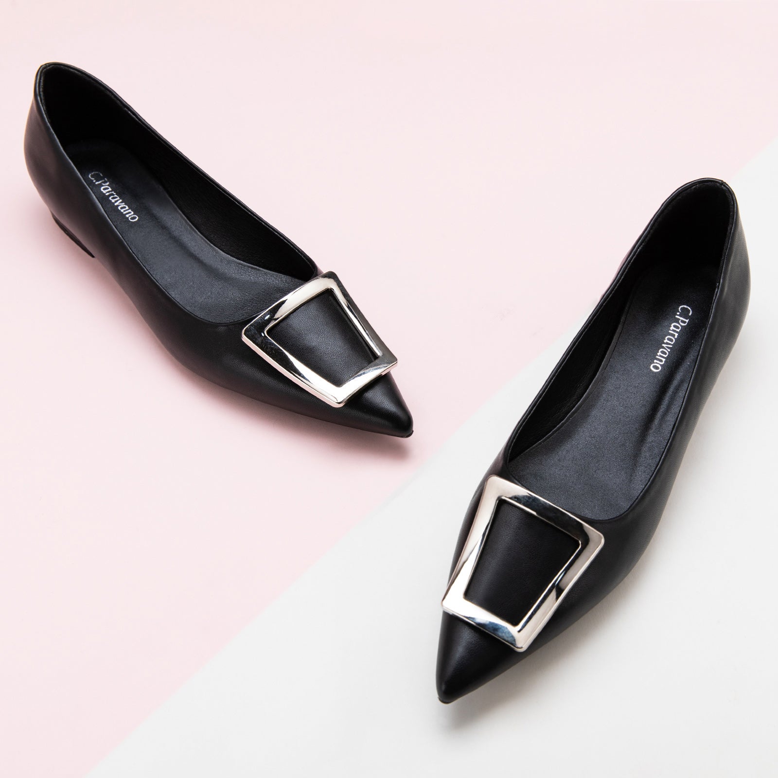  Black Flats with a trapezoidal buckle, perfect for a confident and fashionable look in any urban setting