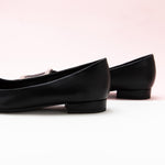 Trapezoidal Buckle Flats in Black, a versatile and chic addition to elevate your footwear collection