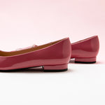 Pink Trapezoidal Buckle Flats, featuring delicate details for a polished and sophisticated style