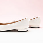 Chic White Slip-on Shoes with Trapezoidal Buckle Detail