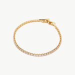 Fine Diamond Charm Bracelet, a manifestation of pure elegance with delicate diamond charms suspended on a fine chain, making it a versatile and refined addition to any jewelry collection