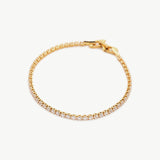 Fine Diamond Charm Bracelet, a manifestation of pure elegance with delicate diamond charms suspended on a fine chain, making it a versatile and refined addition to any jewelry collection