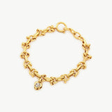 Diamond Heart Chain Bracelet in Gold, a timeless piece that exudes elegance, this bracelet features a delicate chain adorned with diamond-studded hearts, creating a luxurious and classic accessory for any occasion