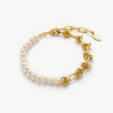 Molten Baroque Pearl Twisted Chain Bracelet in Gold, exuding timeless elegance with a twisted chain design and lustrous baroque pearls, this bracelet offers a luxurious and refined accessory.