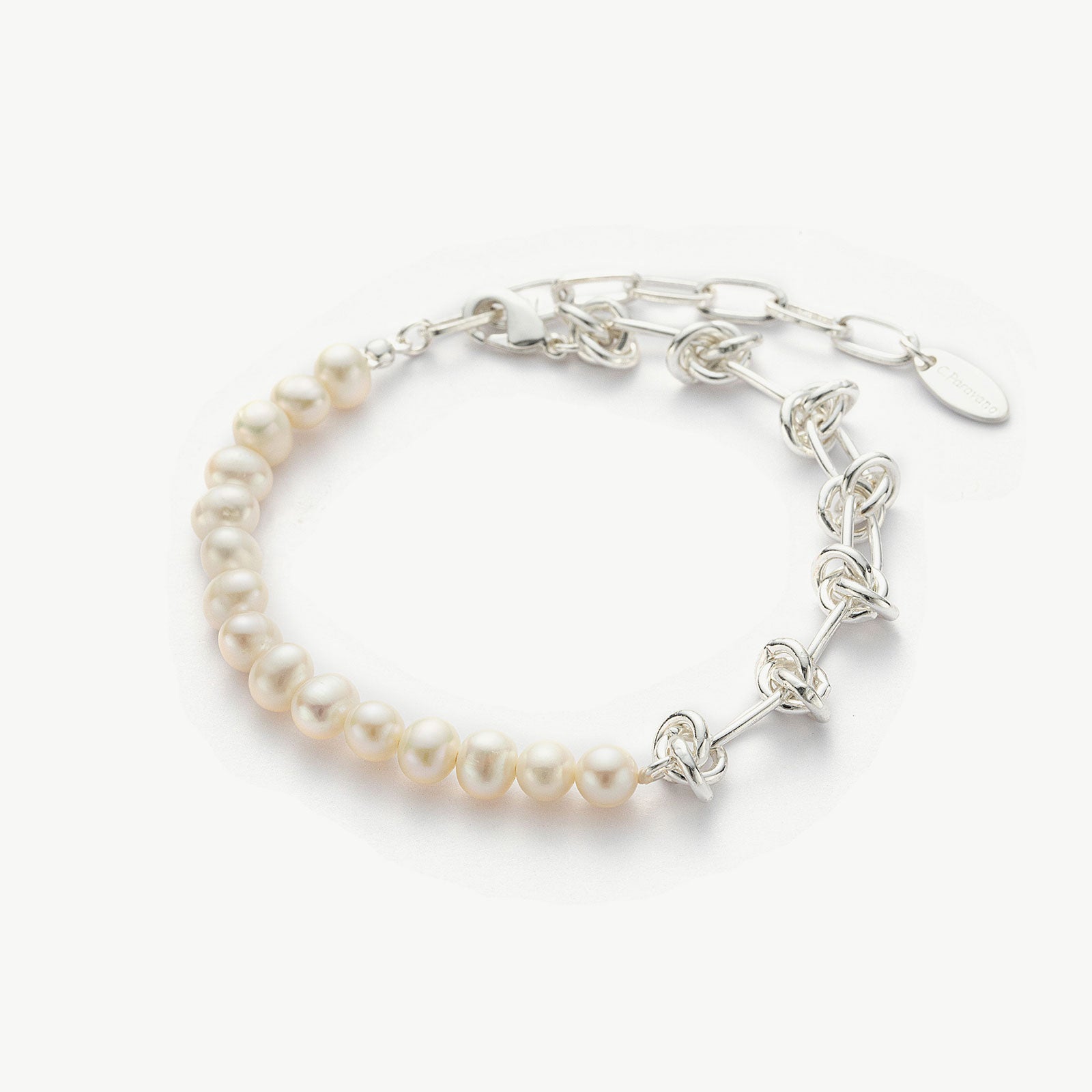 Molten Baroque Pearl Twisted Chain Bracelet in Platinum, exuding timeless elegance with a twisted chain design and lustrous baroque pearls, this bracelet offers a luxurious and refined accessory.