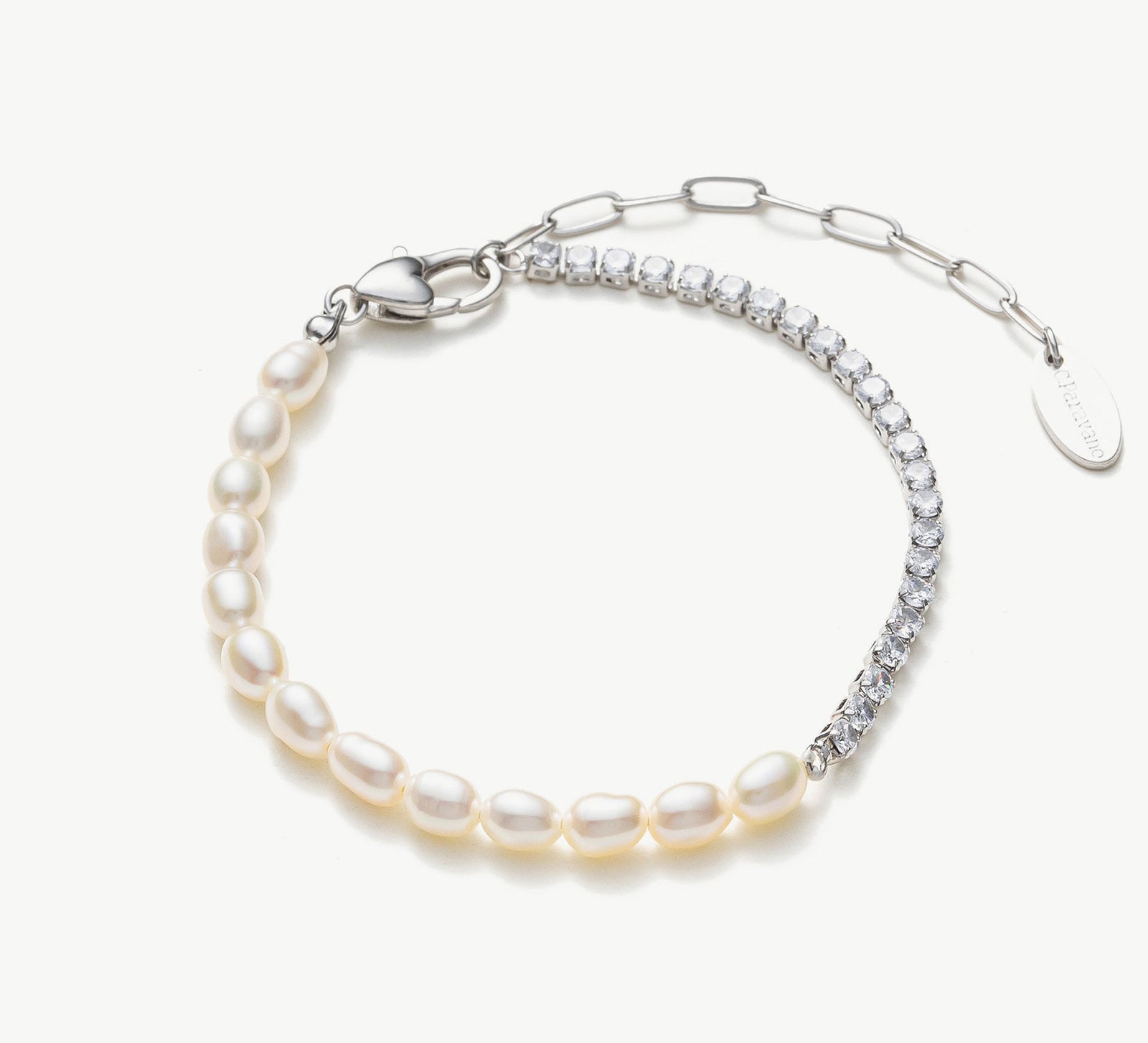 Pearl Crystal Chain Bracelet in Platinum, exuding timeless elegance with a delicate platinum chain adorned with lustrous pearls and sparkling crystals, this bracelet offers a luxurious and refined accessory