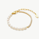 Pearl Crystal Chain Bracelet in Gold, exuding timeless elegance with a delicate chain adorned with lustrous pearls and sparkling crystals, this bracelet offers a luxurious and refined accessory.
