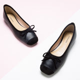 Black Suede Ballet Flats with a charming bow detail, a modern and stylish option for urban chic