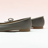Dark Grey Suede Ballet Flats with a charming bow detail, offering a chic and understated option for everyday elegance