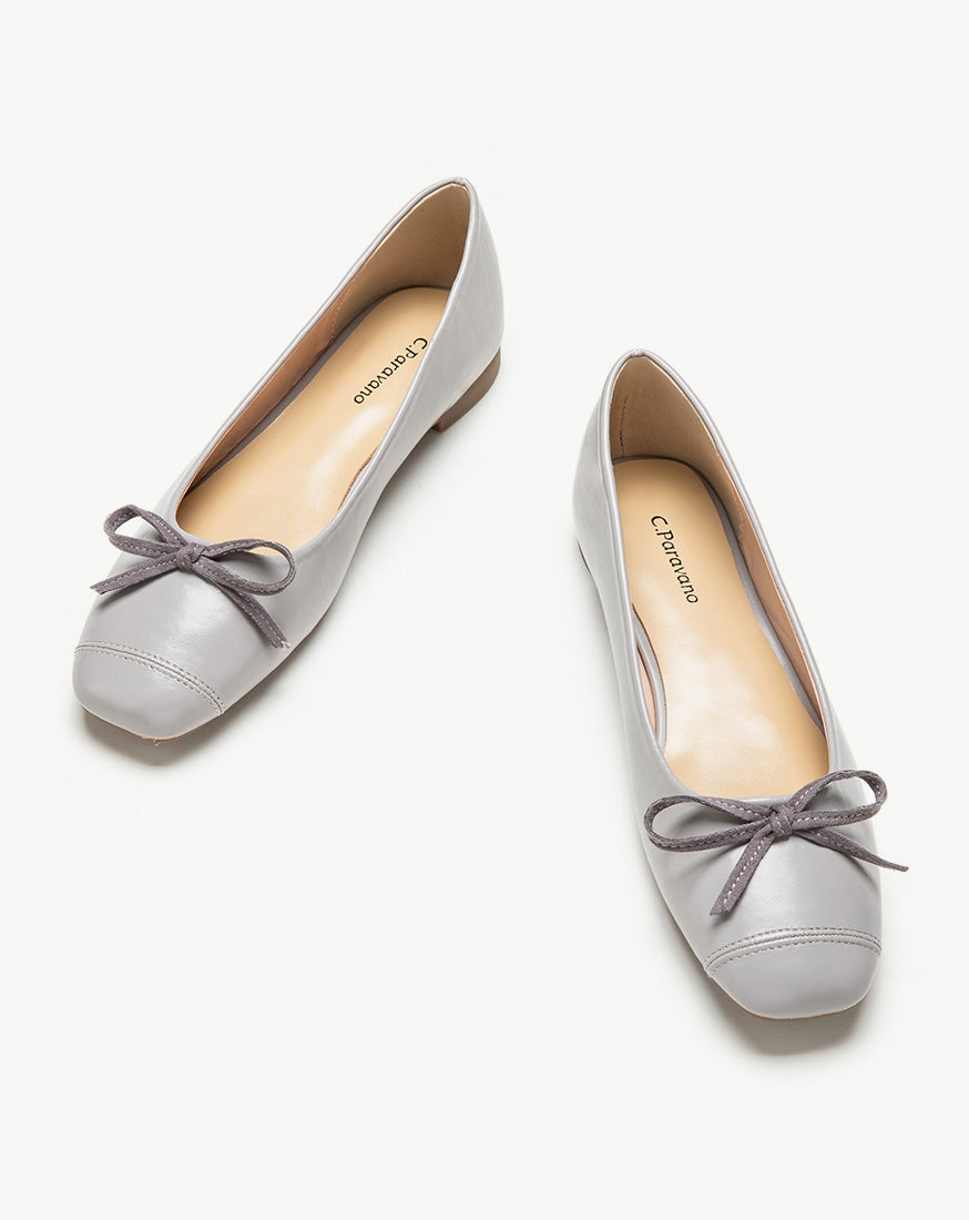 Elegant grey suede ballet flats with a delicate bowknot detail