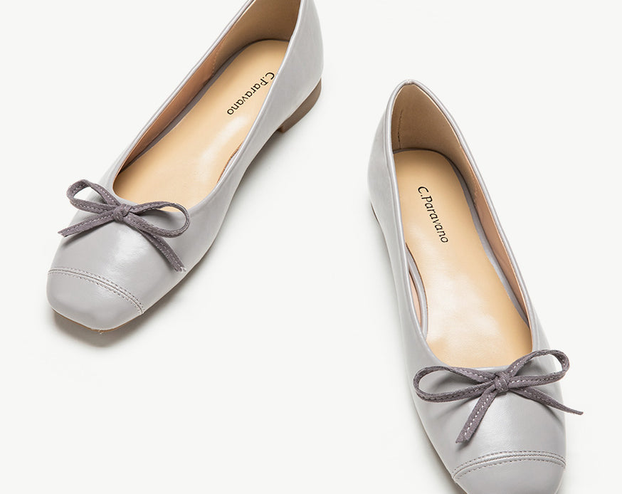 Elegant grey suede ballet flats with a delicate bowknot detail