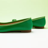  Green Suede Ballet Flats with a charming bow detail, bringing a touch of nature-inspired elegance to your ensemble
