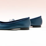 Navy Suede Ballet Flats with a charming bow detail, offering a chic and stylish option for a timeless look.