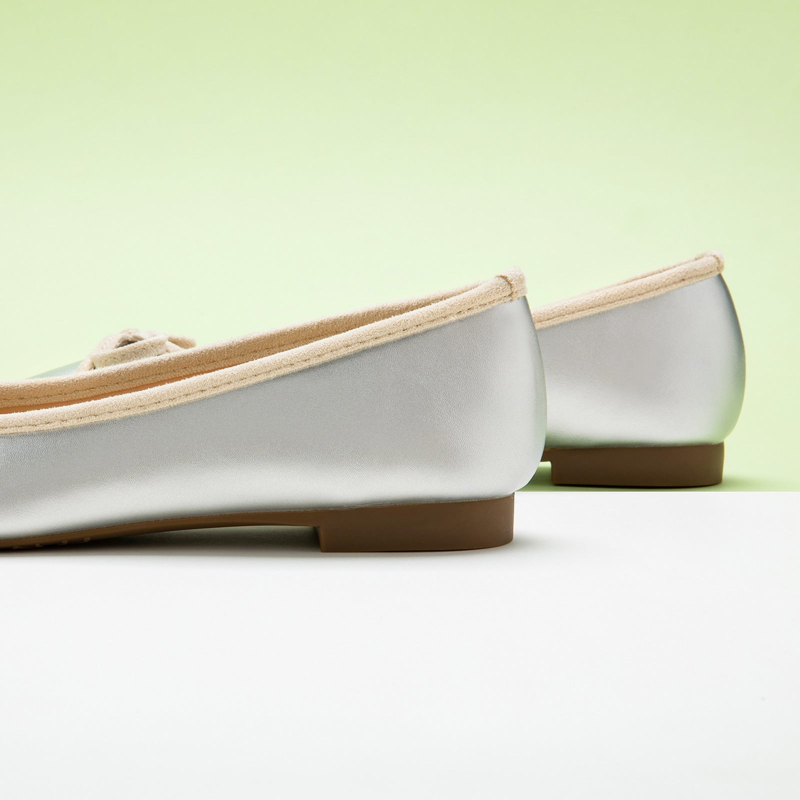 Silver Suede Ballet Flats with a charming bow detail, offering a chic and stylish option for special occasions