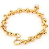 Diamond Heart Chain Bracelet in Gold, an embrace of love and luxury, this bracelet features linked hearts adorned with diamonds, set in a radiant gold chain, making it a meaningful and stylish addition to your jewelry collection