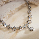 White Gold Diamond Heart Bracelet, embodying the romance of white gold, this bracelet features a chain of intricately crafted hearts adorned with diamonds, creating a stunning and romantic accessory for expressing love and style