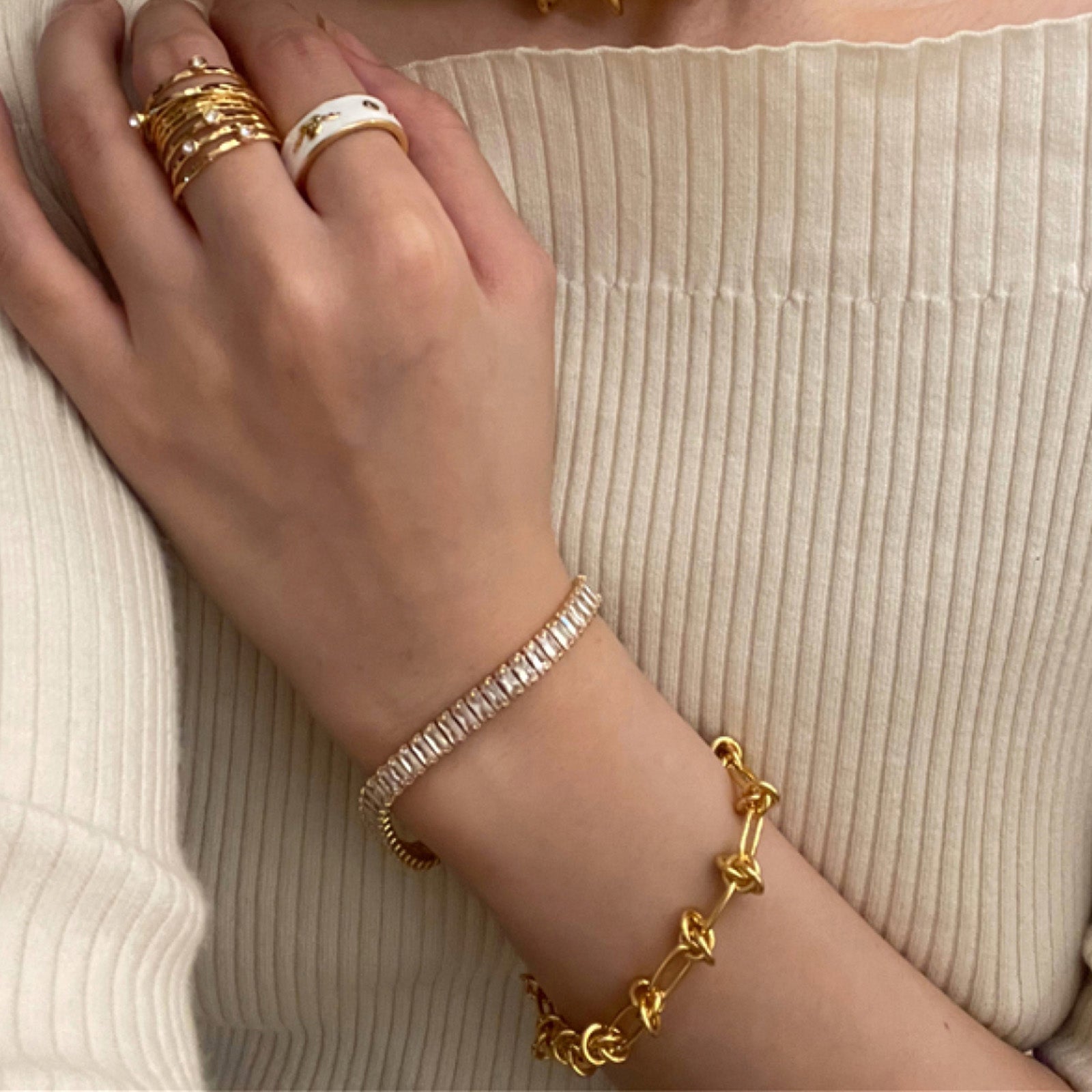 Molten Baroque Pearl Twisted Chain Bracelet, sculpted to perfection with gold details, this bracelet exudes opulence and sophistication, making it a statement piece for any occasion