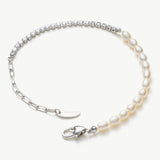 Pearl Crystal Chain Bracelet featuring a platinum chain embellished with pearls and crystals, this bracelet radiates with the luminous glow of pearls and the sparkling brilliance of crystals, adding a touch of radiant beauty to your wrist