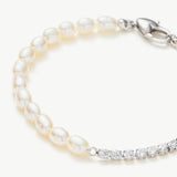 Pearl Crystal Chain Bracelet, a fusion of modern design and classic pearls and crystals in platinum, this bracelet brings a contemporary twist to traditional elegance, making it a versatile and chic accessory