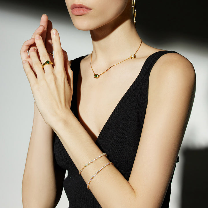 Pearl Crystal Chain Bracelet, coiled with a touch of gold luxury, this bracelet adds a hint of glamour and sophistication to your wrist, making it perfect for special occasions.