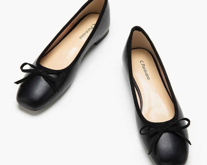 Black-ballet-flats-with-a-charming-bowknot-detail_-perfect-for-a-touch-of-elegance.