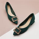  Embellished Mid Heel Pumps in a rich green hue, adding a pop of color to your look