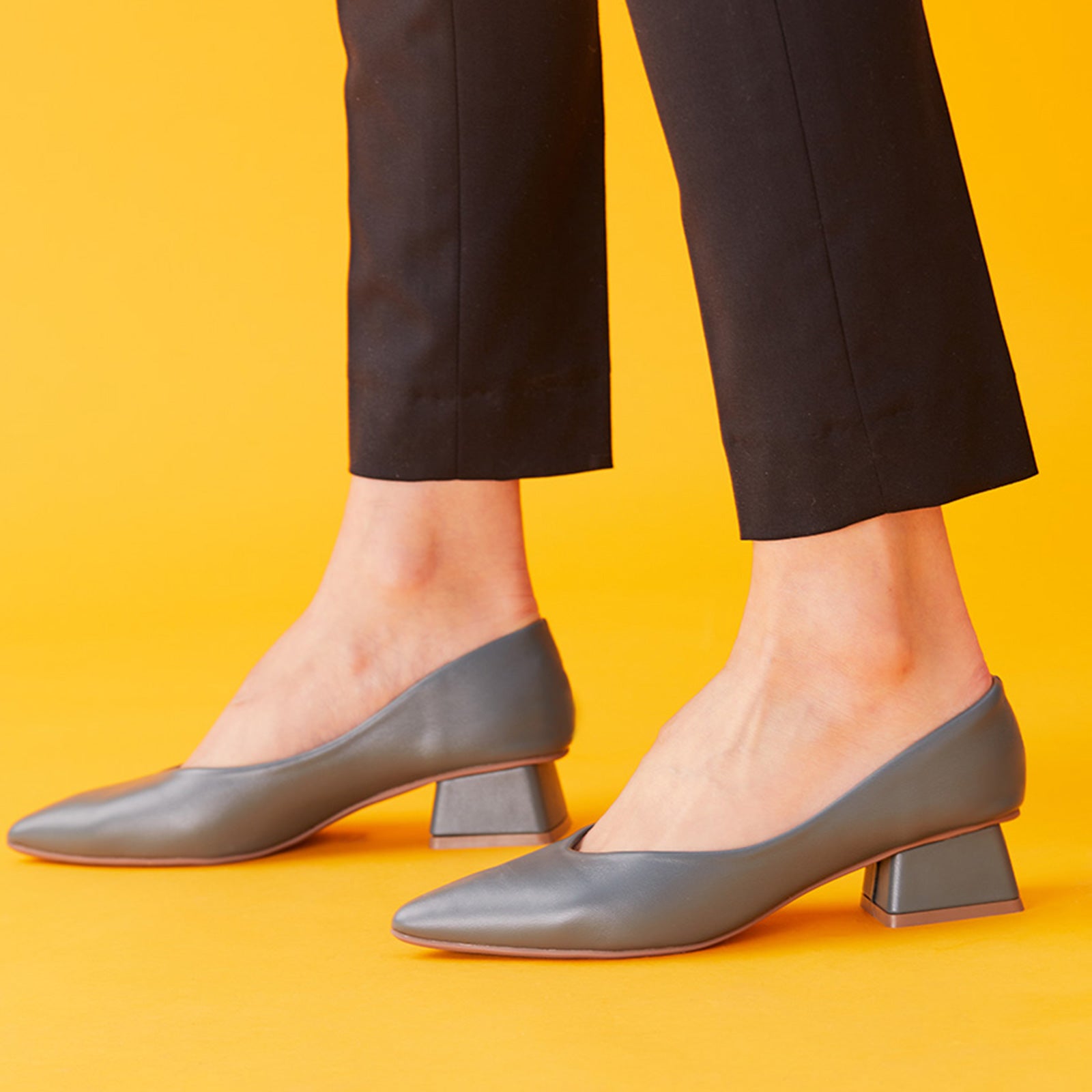 Embrace versatile and stylish flair with these blue block heel pumps, featuring a striking color for a timeless and fashionable look