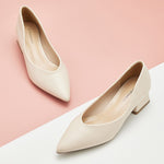 Chic White Block Heel Pumps: Modern Versatility.