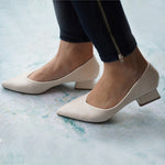 Crisp white block heel classic pumps – timeless and versatile for various occasions
