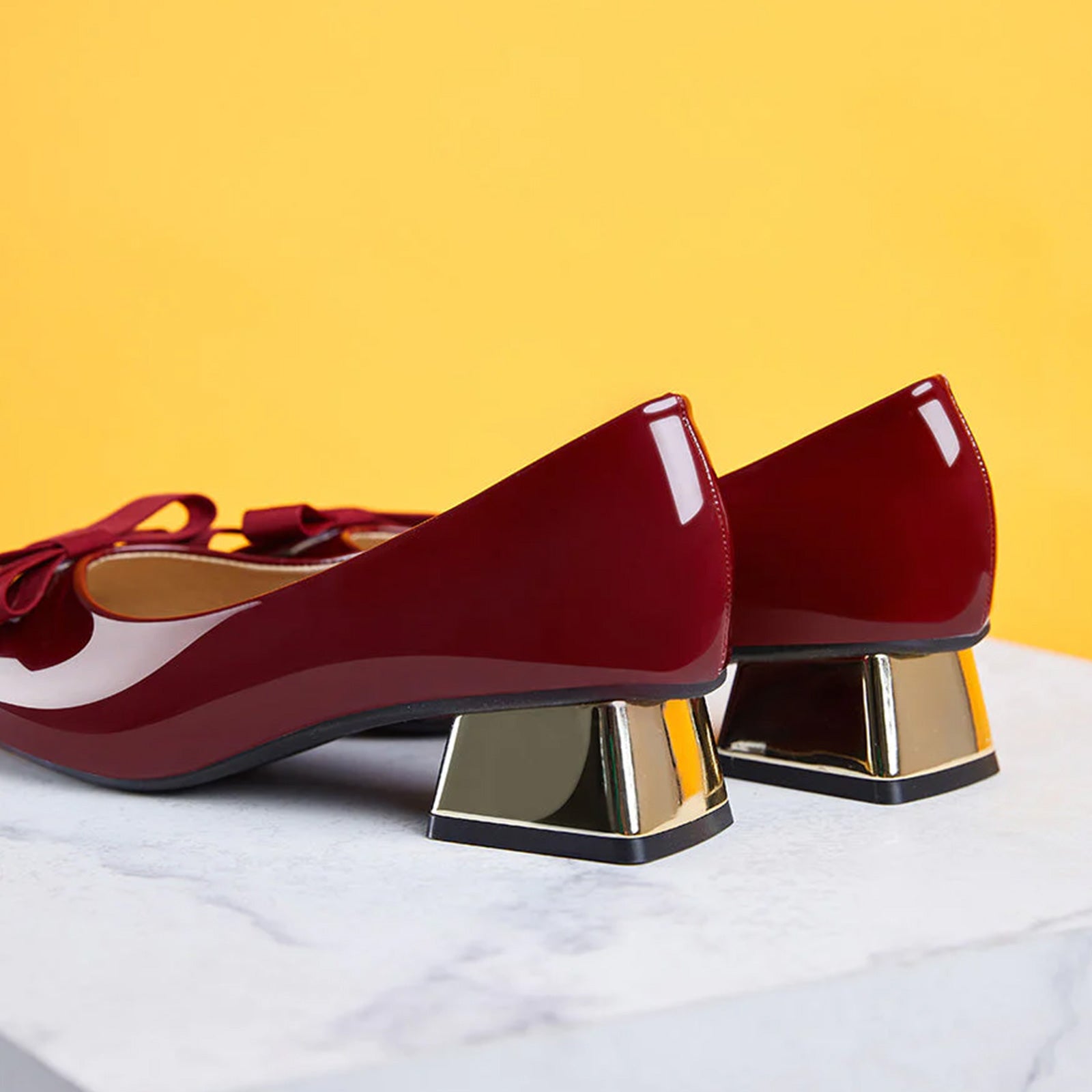 Patent Leather Block Heel Pumps in Red, combining timeless elegance with a modern twist