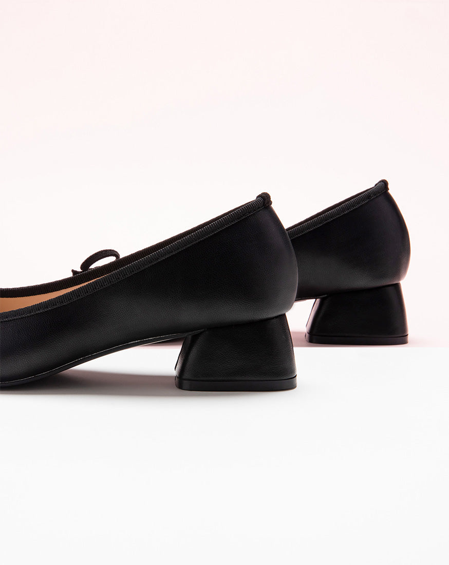 Step Into Style with Bowknot Adorned Black Low Heels - Make a statement with these fashionable low heels that effortlessly combine sophistication and trendiness