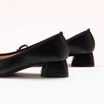 Step Into Style with Bowknot Adorned Black Low Heels - Make a statement with these fashionable low heels that effortlessly combine sophistication and trendiness
