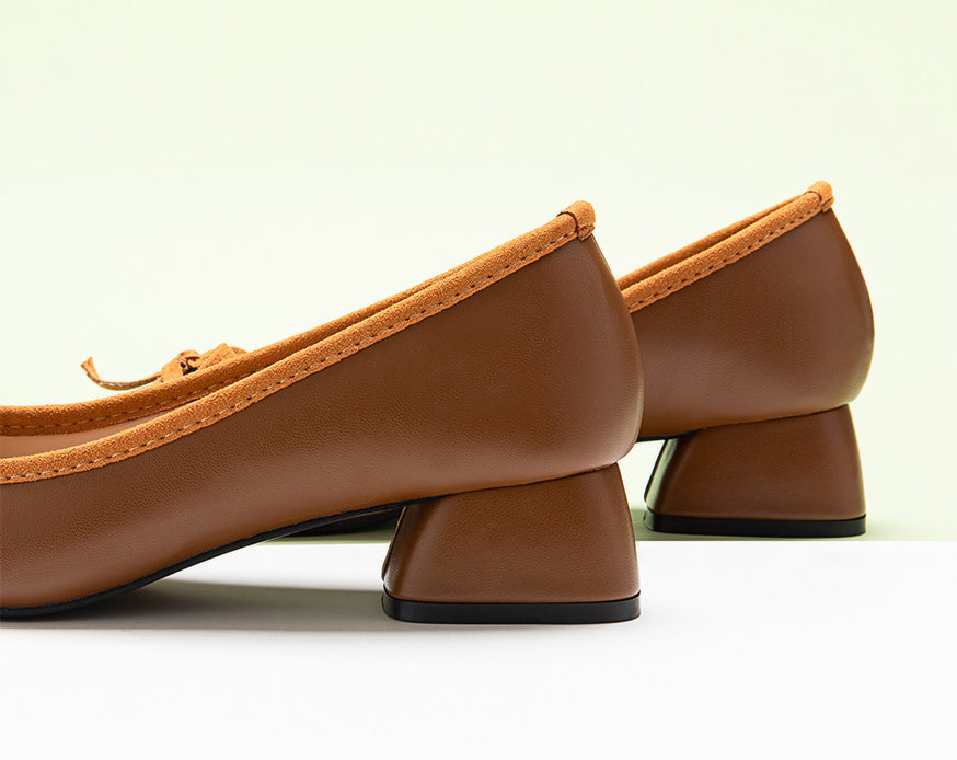 Chic Brown Heels adorned with a Fashionable Bowknot