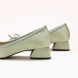 Chic Green Heels adorned with a Fashionable Bowknot