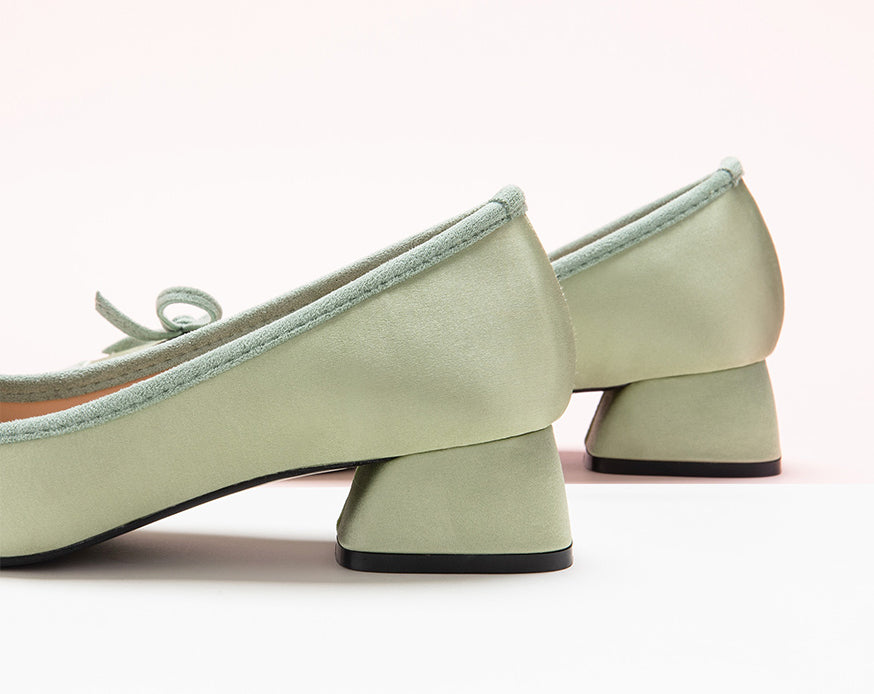 Chic Green Heels adorned with a Fashionable Bowknot