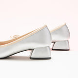Chic Silver Heels adorned with a Fashionable Bowknot