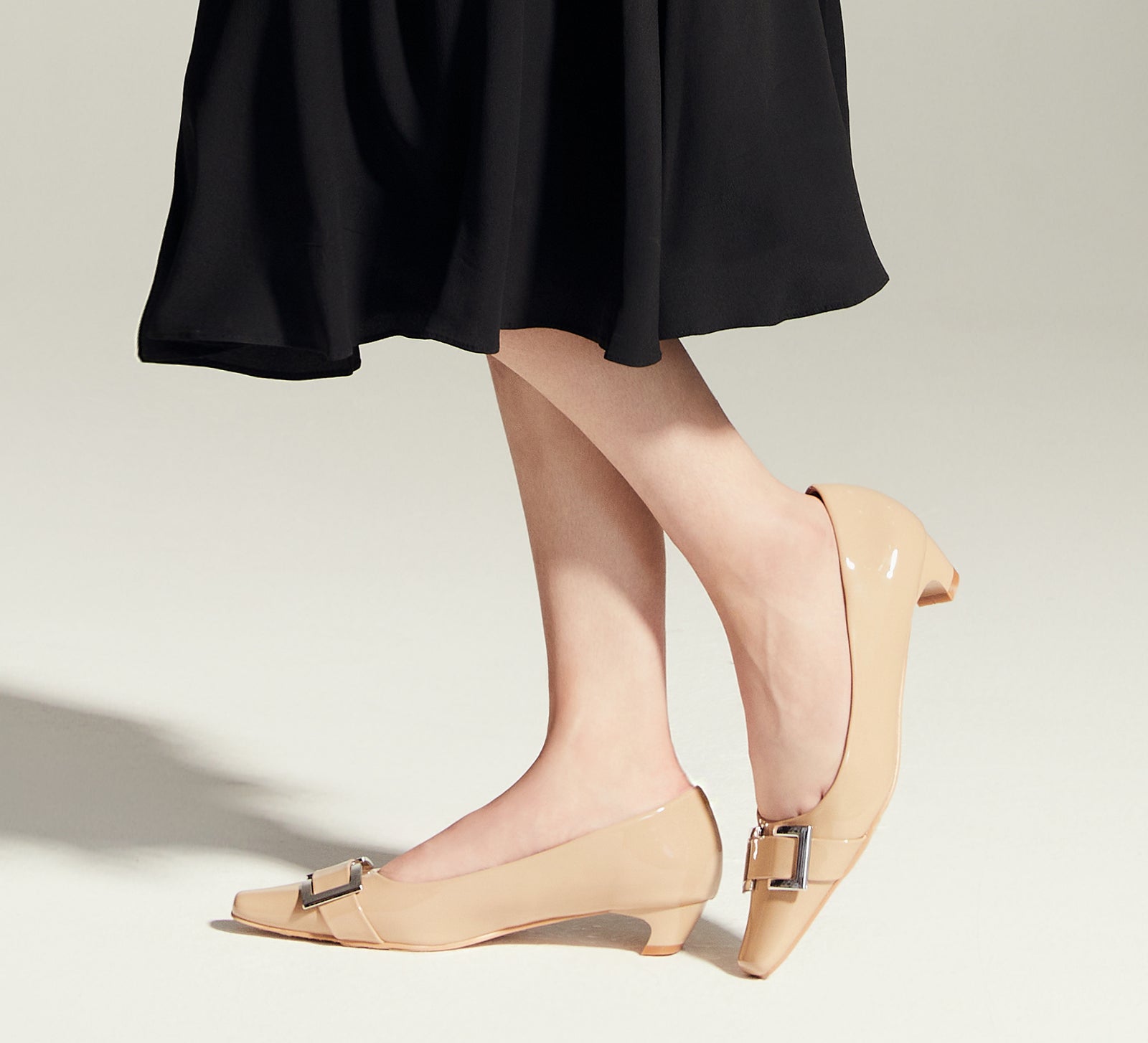 Timeless Neutrals: Metal Buckle Low Heels in Beige, featuring classic details for a refined and understated look