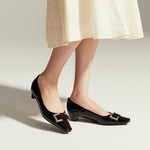 Low Heels in Black with distinctive metal buckles, a chic and minimalist addition to your footwear collection