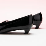 Metal Buckle Low Heels in Black, a timeless and versatile option for everyday elegance.