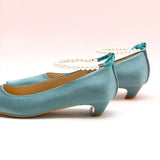 Charming Blue Heels adorned with Pearl Straps