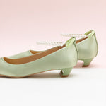 Sleek Green Heels adorned with Pearl Accents
