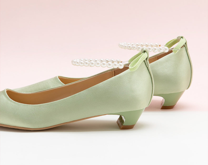 Sleek Green Heels adorned with Pearl Accents
