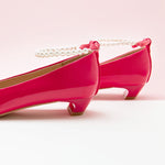  Pearl Straps Low Heel in Hot Pink, adding a touch of modernity to your ensemble in a vibrant color